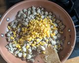 A picture of step 4 of Jacket Potato with sausage mix.