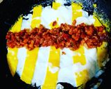 A picture of step 3 of Hot dog egg Roll Up.