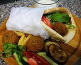 A picture of step 7 of Falafel sandwich||Falafel wrap.