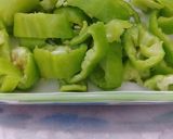 A picture of step 1 of Green chilli in curd.