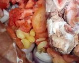 A picture of step 1 of Aloo Gosht.