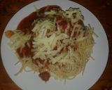 A picture of step 7 of Italian meatballs with spaghetti.