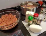 A picture of step 1 of Bring-a-smile chicken burgers with blue cheese or pesto filling 😊.