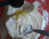 A picture of step 5 of Orange Marble Swiss Roll.