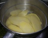 A picture of step 4 of Pan fried turmeric and garam potatoes#RamathanContest.