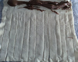 Foto del paso 3 de la receta: Rosquilla de hojaldre rellena de Nutella