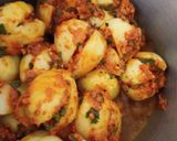 A picture of step 5 of Stuffed Potato Curry (garam masala).