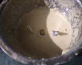 A picture of step 2 of Cauliflower curry with white gravy.