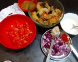 A picture of step 1 of Chingri macher malai curry.