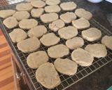 A picture of step 10 of Spiced Swiss roll cookie slices.