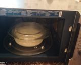A picture of step 7 of Chhena poda Orissa dish.