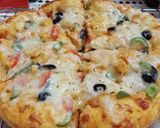 A picture of step 4 of Chicken Tikka Pizza 🍕🧀🍕.