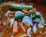 Gambar langkah 3 resipi Tomyam ayam.