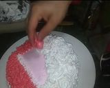 A picture of step 8 of Santa Claus Cake.