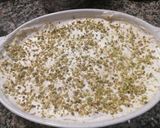 A picture of step 5 of Lemon Cream Tiramisu with Limoncello, Pistachios, and Caramelized Lemon.