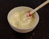 A picture of step 6 of White Chocolate Cherry Truffle Cheesecake.