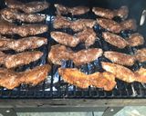 A picture of step 4 of Spicy dry jerk rubbed smoked chicken wings.