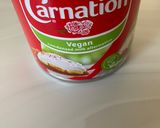 A picture of step 1 of Vegan condensed milk coconut and almond bites.