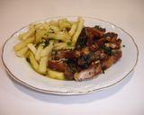 Foto del paso 8 de la receta Costillas de cordero con patatas fritas