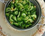 A picture of step 1 of Bitter gourd with chana dal masala.