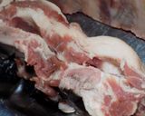 Foto del paso 2 de la receta: Asado, pechito y bondiola de cerdo a la parrilla saborizados
