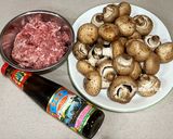 A picture of step 1 of Baked Stuffed Mushrooms with Pork.