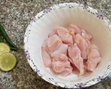 A picture of step 1 of Chicken tandoori tikka boti in frying pan.