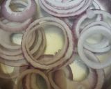 A picture of step 1 of Laccha Pyaz or Masala Pickled Onions.