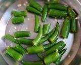 A picture of step 2 of Amla pickle in mustard oil.
