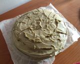 Foto del passaggio 6 della ricetta Torta al cioccolato ripiena e ricoperta di crema al pistacchio