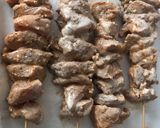 A picture of step 2 of Greek Pork Souvlaki with Greek Salad and Flatbread.