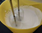 A picture of step 5 of No Bake Blueberry Biscuit Cake.