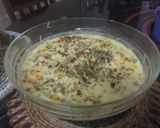 A picture of step 5 of Potato baked dish with garlic bread.