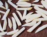A picture of step 2 of Baked Potato Wedges.