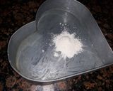 A picture of step 6 of Double Heart cake.
