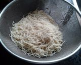 A picture of step 4 of Garlic noodles.