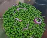 A picture of step 2 of 7 layer Salad.