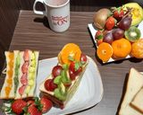 Foto langkah ke 7 dari resep Sandwich Buah Ceria.