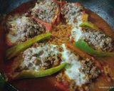 Foto del paso 5 de la receta: 🌶️ Morrones rellenos en salsa con arroz 🍲