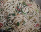 A picture of step 4 of Singaporean rice.