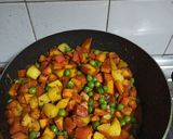 A picture of step 15 of Gajar Aloo Matar.