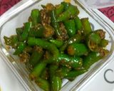 A picture of step 6 of Green chilli pickle.
