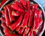 A picture of step 1 of Bharwa lal mirch ka achar.