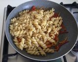 A picture of step 5 of Fusilloni with Datterini Tomato Purée, Shrimp, Mini Peppers, and Walnuts.