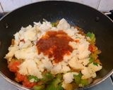 A picture of step 5 of Grilled Schezwan Aloo cheese sandwiches.