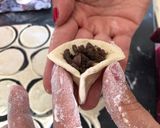 A picture of step 4 of Shish Barak - Lebanese meat dumplings in cooked yogurt.