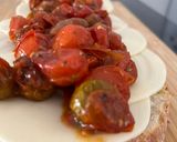 Foto del paso 3 de la receta: Pan pizza con tomates cherry asados, mozzarella y albahaca