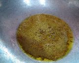 A picture of step 5 of Sarso ka saag with makki roti.