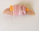 A picture of step 3 of Bacon wrapped Cheddar Chicken.