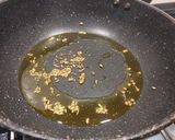 A picture of step 2 of Lau Ghonto or Bottle Gourd Curry.